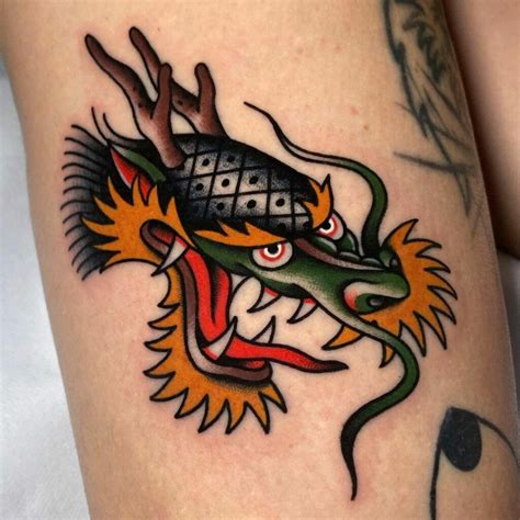 dragon head tattoo|traditional dragon tattoo designs.